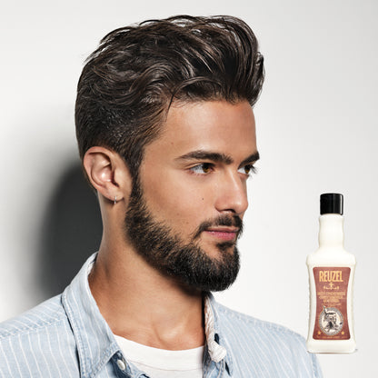 Reuzel Daily Conditioner bottle with product label, showcasing the Reuzel brand and conditioner for hair care.