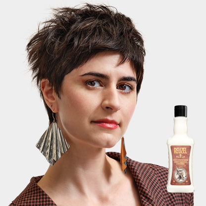 Reuzel Daily Conditioner bottle with label, designed for nourishing hair, shown on a neutral background.