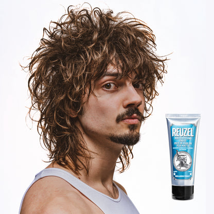 Reuzel Matte Styling Paste in a squeeze tube, showcasing its smooth, matte finish for versatile hair styling.
