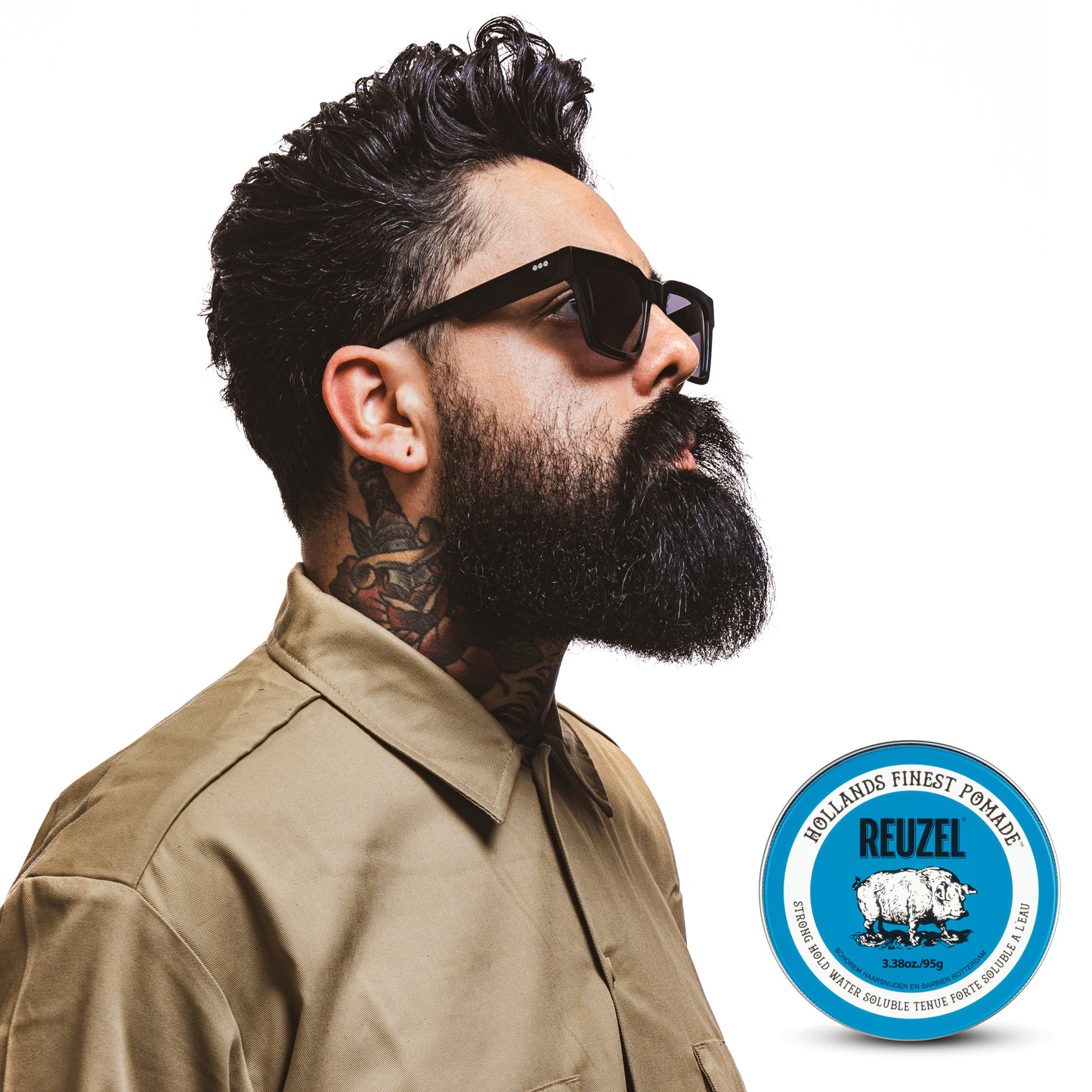 Reuzel Blue Pomade for road trip styling, featuring a classic jar with a blue lid, ideal for sleek, shiny hair looks.
