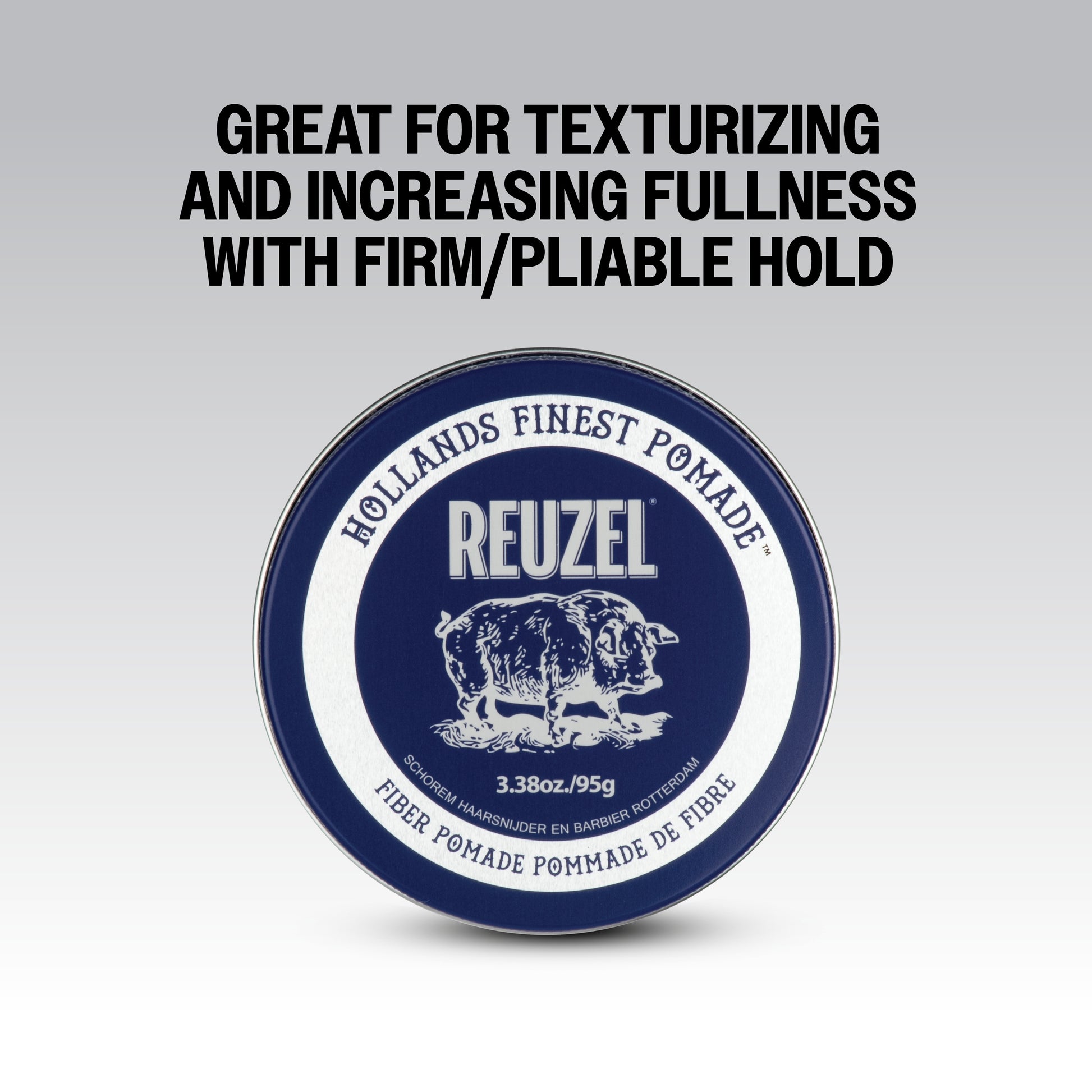 Reuzel Road Trip To Go Fiber Pomade jar with black lid and label, showing product details and branding.