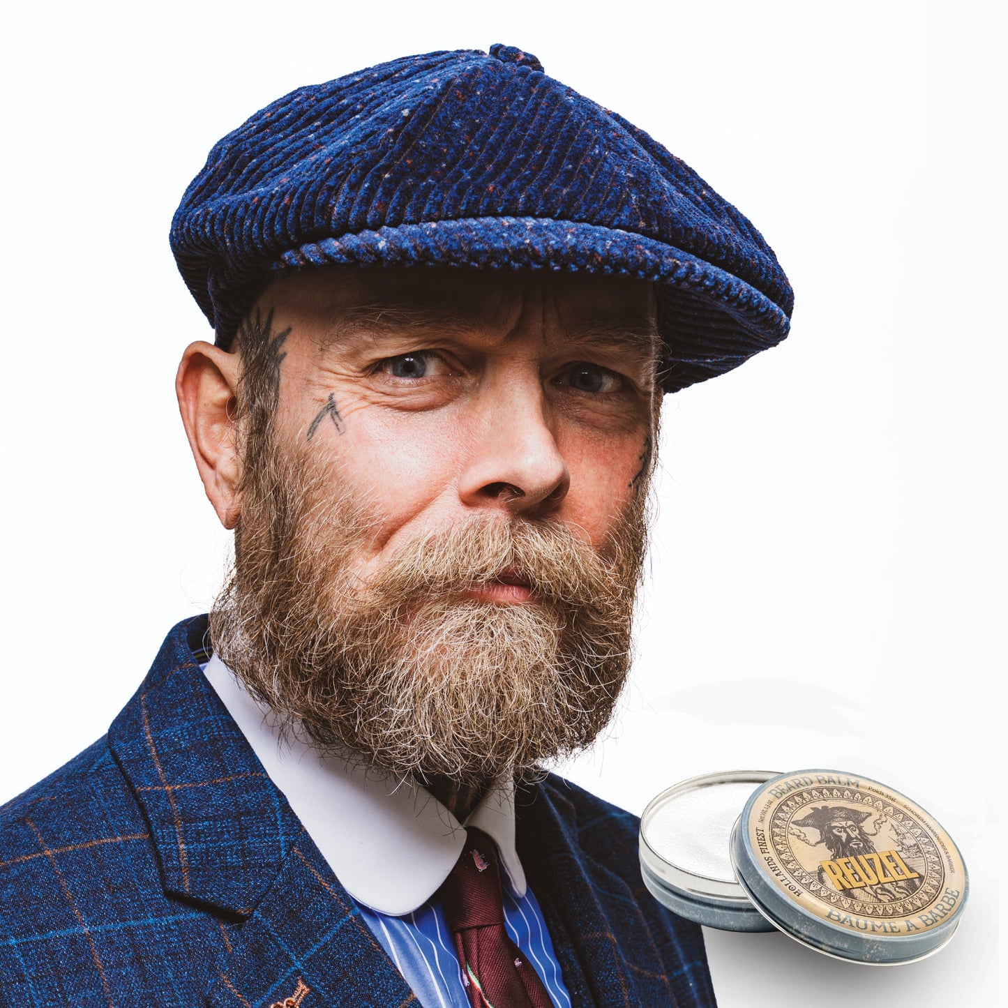 Reuzel Beard Balm Wood & Spice in a jar, with a natural wood and spice scent, designed for nourishing and styling men's beards.