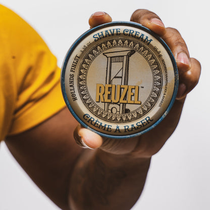 Reuzel beard shave cream in a jar, smooth and creamy texture for close, comfortable shaves with beard grooming products.