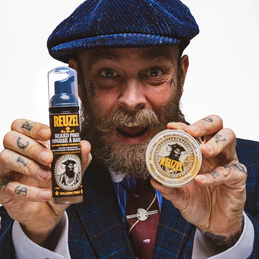 Reuzel Germany beard care gift set with beard balm and beard foam, displayed in a sleek box for grooming and styling.